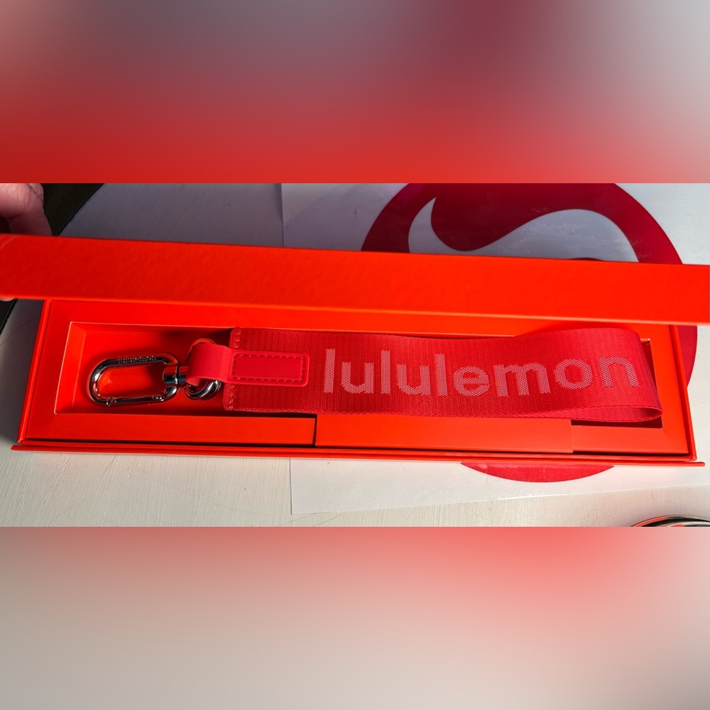 Lululemon red Never Lost keychain new in box